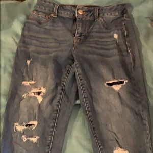 Distressed jegging w flannel underlay patched